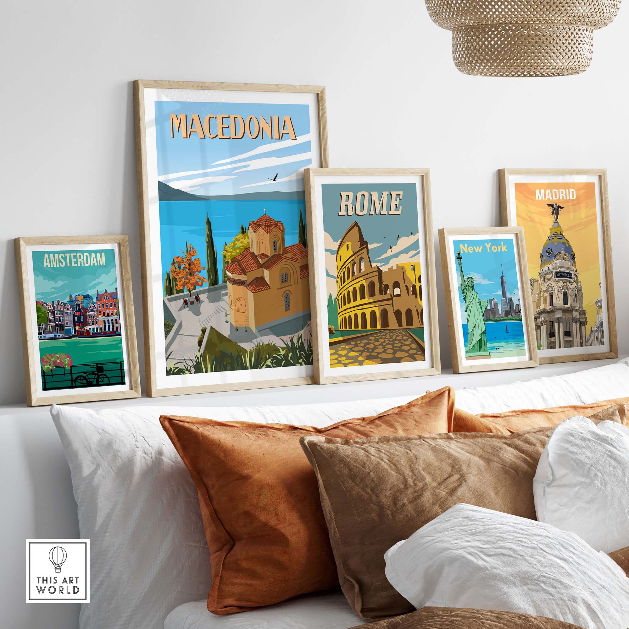 Colorful travel posters featuring Macedonia, Rome, Amsterdam, New York, and Madrid displayed on a cozy wall.