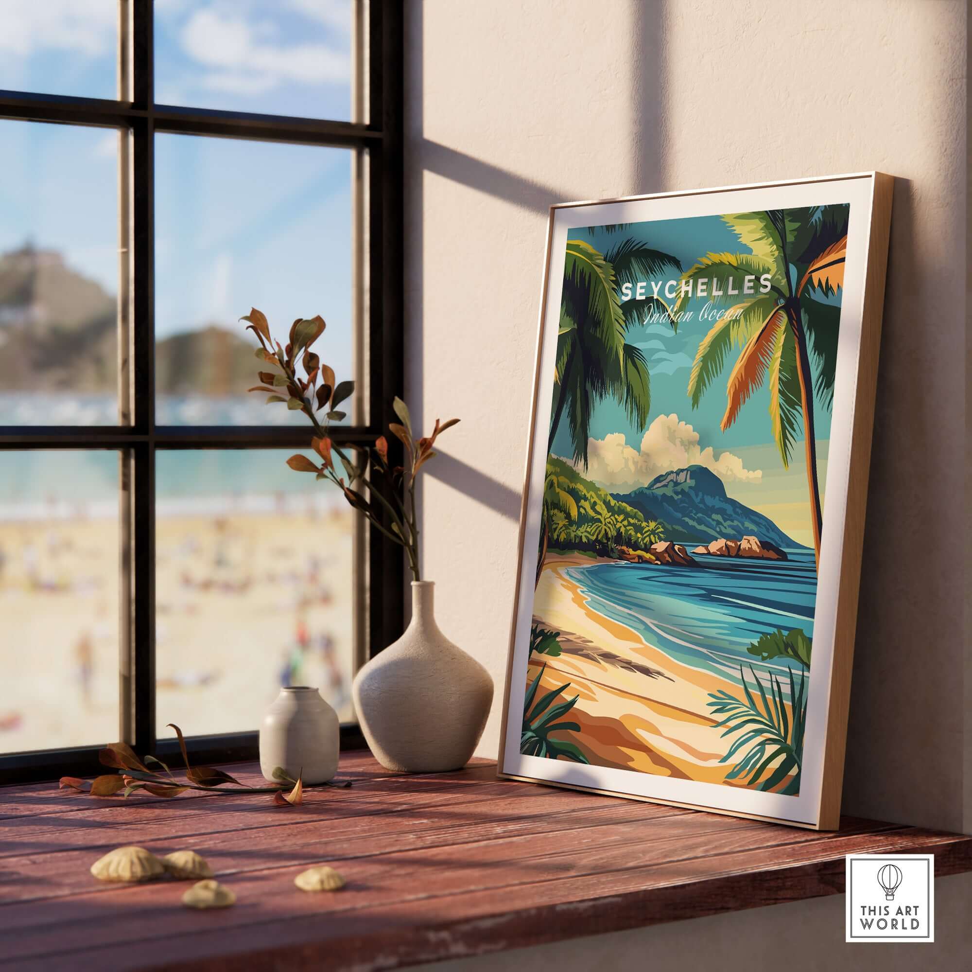 Seychelles Serenity: Stunning Beach Print Decor displayed on a table near a window with tropical views.