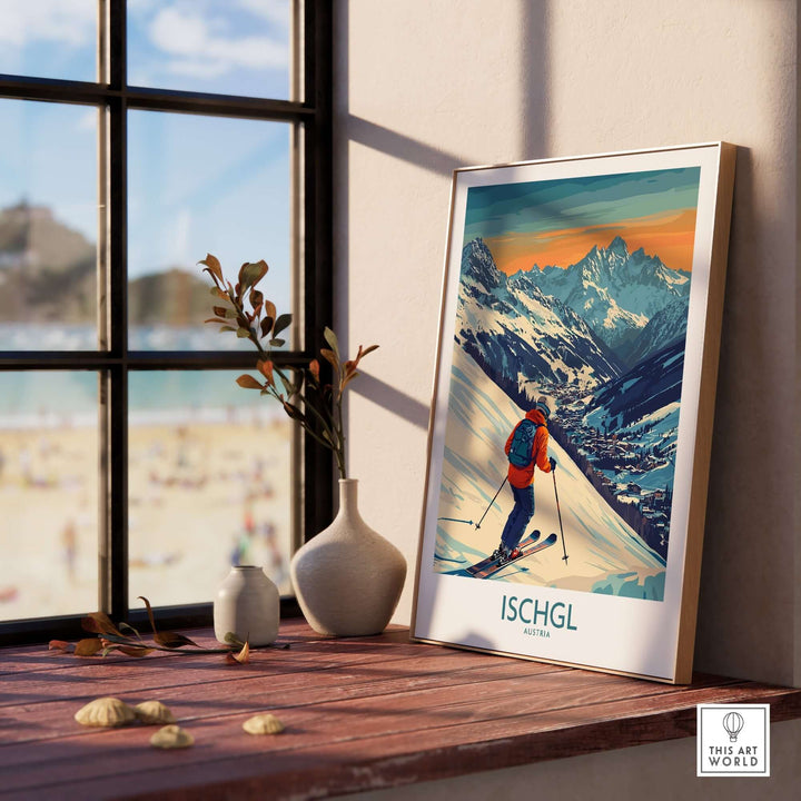 Ski poster of Ischgl, Austria displayed on a window ledge with a beautiful mountain view, inspiring winter adventure.