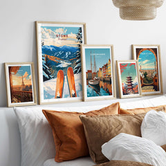 Gallery of ski and travel posters, featuring Stowe, Vermont, in a stylish home decor setting.