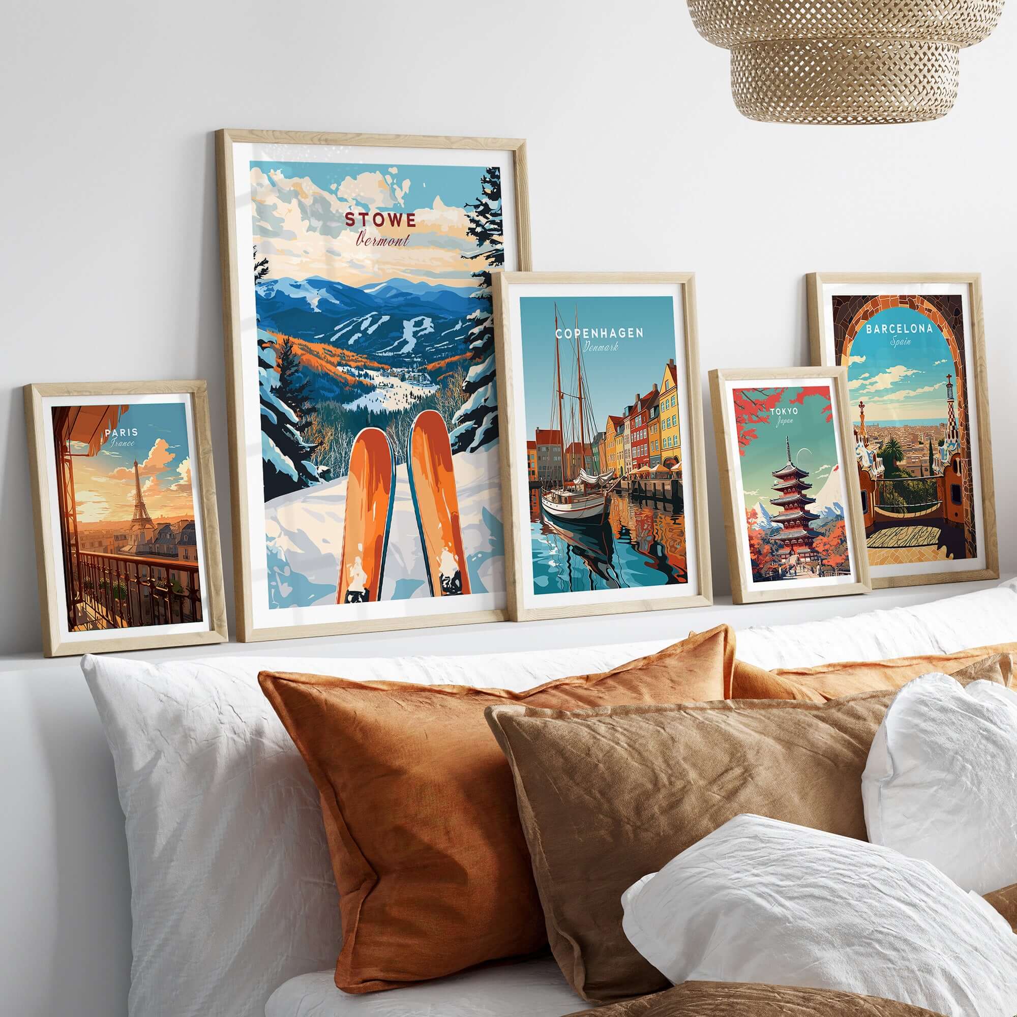 Gallery of ski and travel posters, featuring Stowe, Vermont, in a stylish home decor setting.