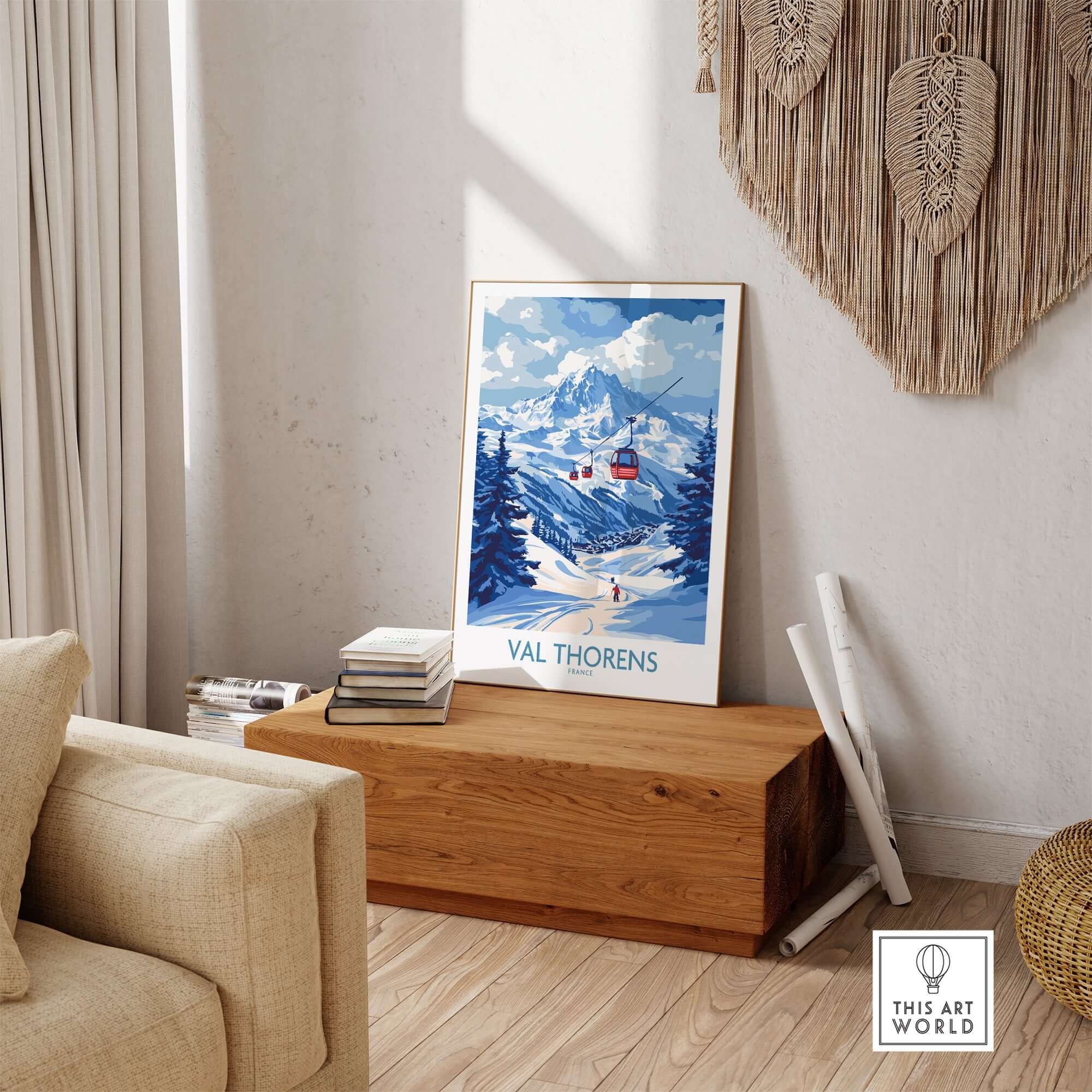 Ski Poster Val Thorens | Ski Trip Memories Wall Art displayed in a cozy living space on a wooden table.