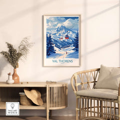 Ski Poster Val Thorens | Ski Trip Memories Wall Art displayed in a cozy interior setting with a chair and plant.