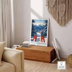 Ski poster of Whiteface Mountain with red skis in a cozy interior setting, showcasing winter beauty and adventure.