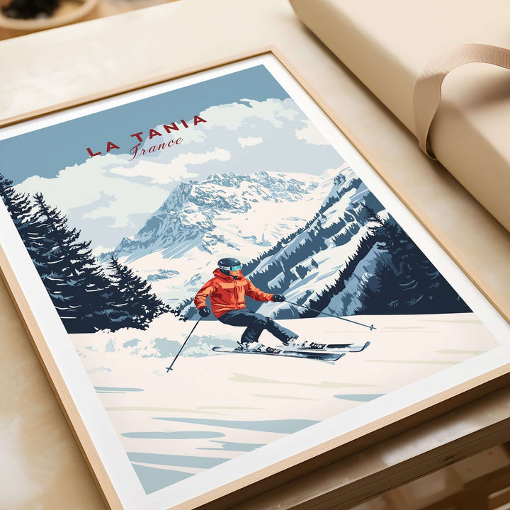 Ski print of La Tania, France featuring a skier with snow-covered mountains in the background. Perfect for ski enthusiasts.