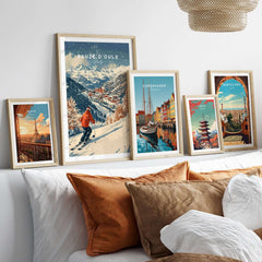 Ski print of Sauze d'Oulx, Italy, displayed among travel art prints on a cozy couch setting.