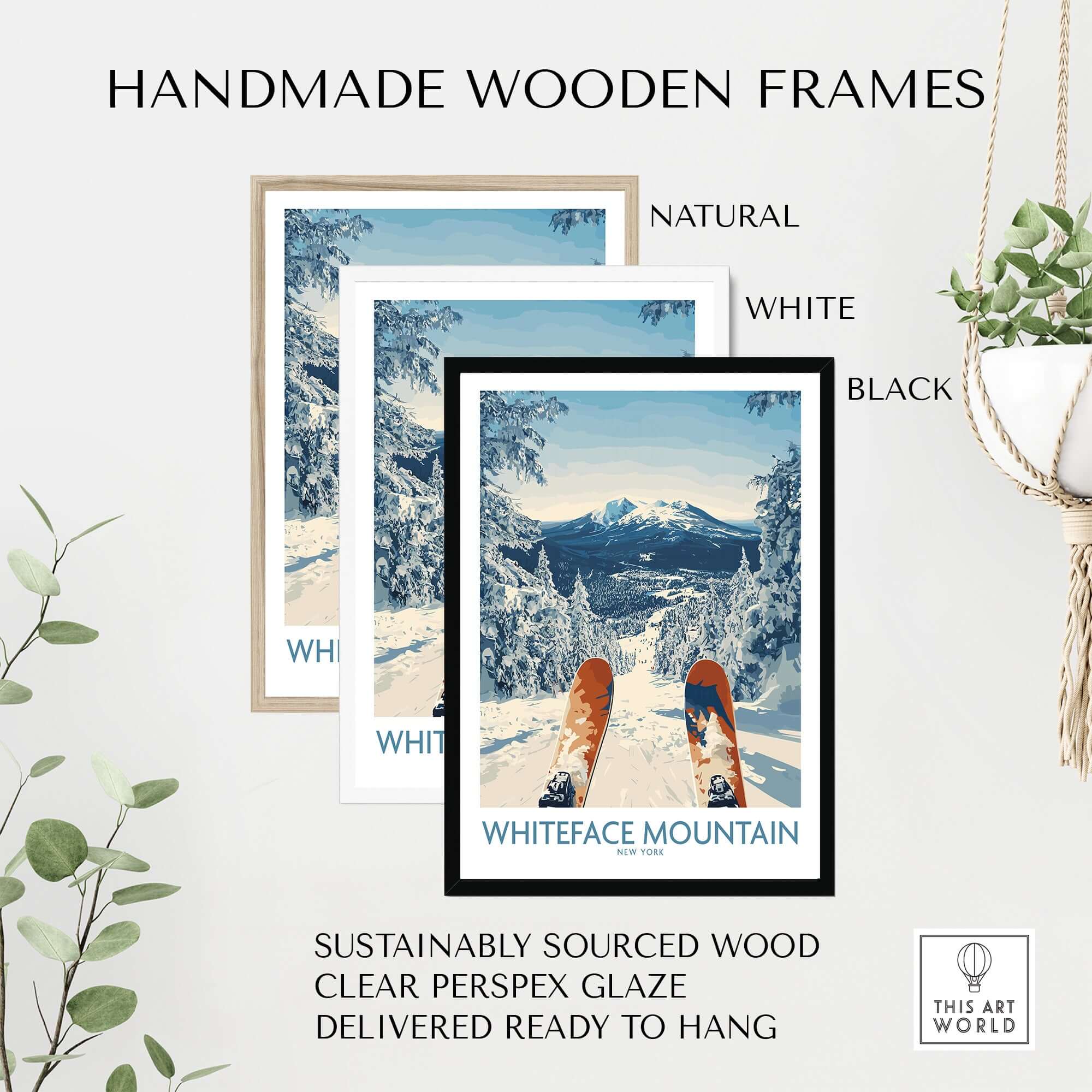 Handmade wooden frames in natural, white, and black displaying artwork of Whiteface Mountain with skis.