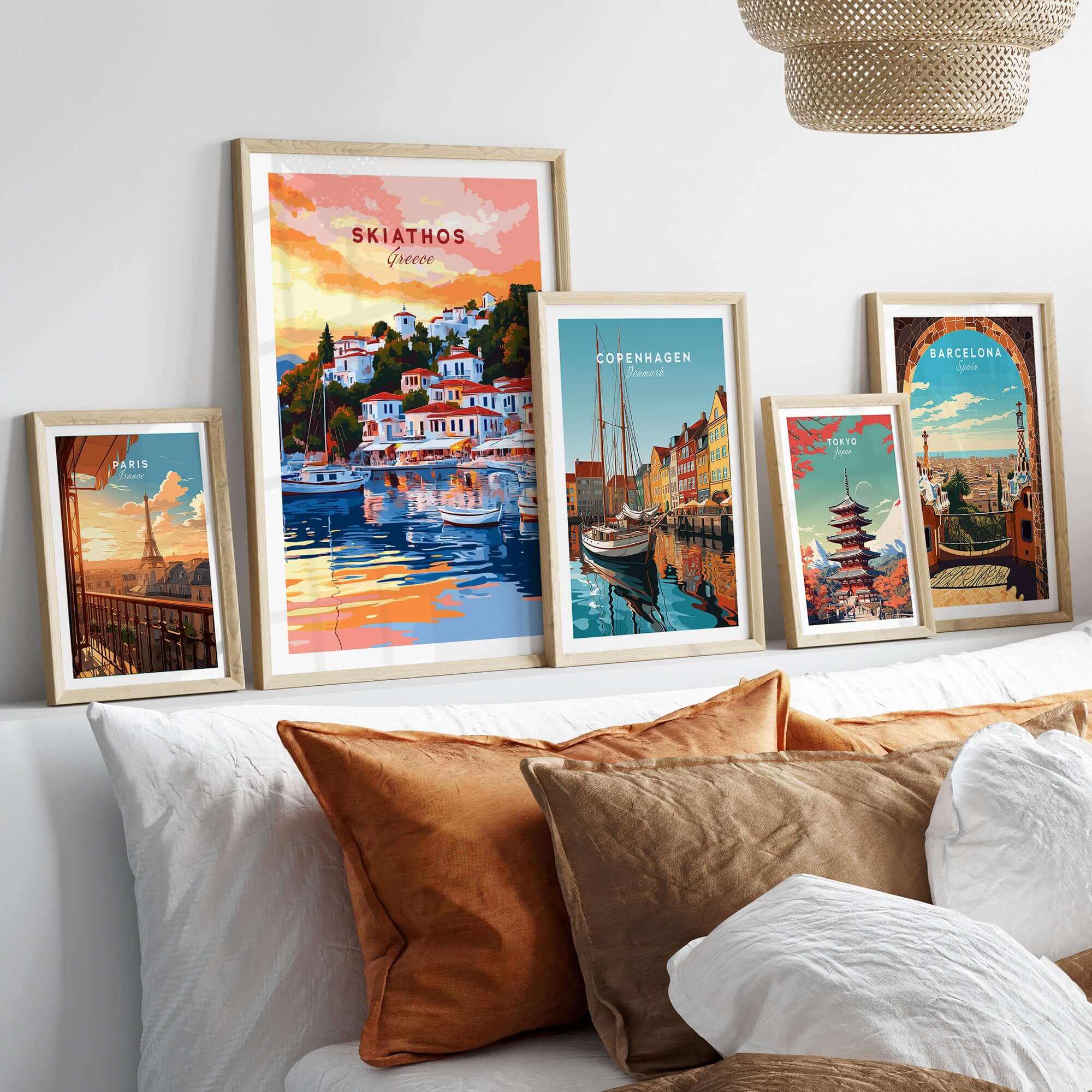 Skiathos Art Prints - Greece Travel Poster displayed in elegant frames on a stylish interior sofa.