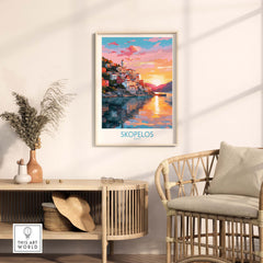 Skopelos wall art travel poster showcasing vibrant colors and sunset reflecting on water in a modern living room decor.