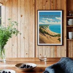 Sleeping Bear Dunes National Lakeshore art print in black frame displayed in rustic kitchen