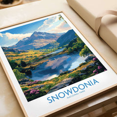 Snowdonia National Park Art Print featuring a scenic landscape with mountains and a lake.