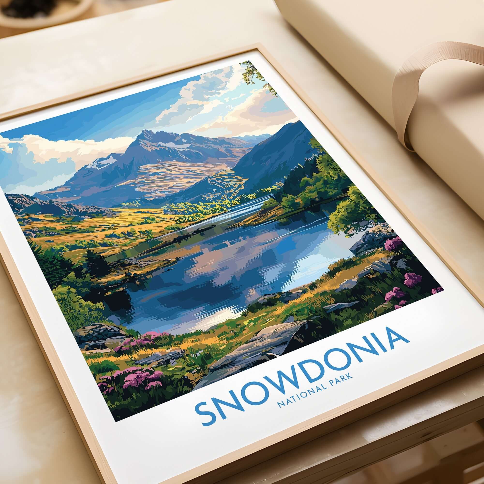 Snowdonia National Park Art Print featuring a scenic landscape with mountains and a lake.