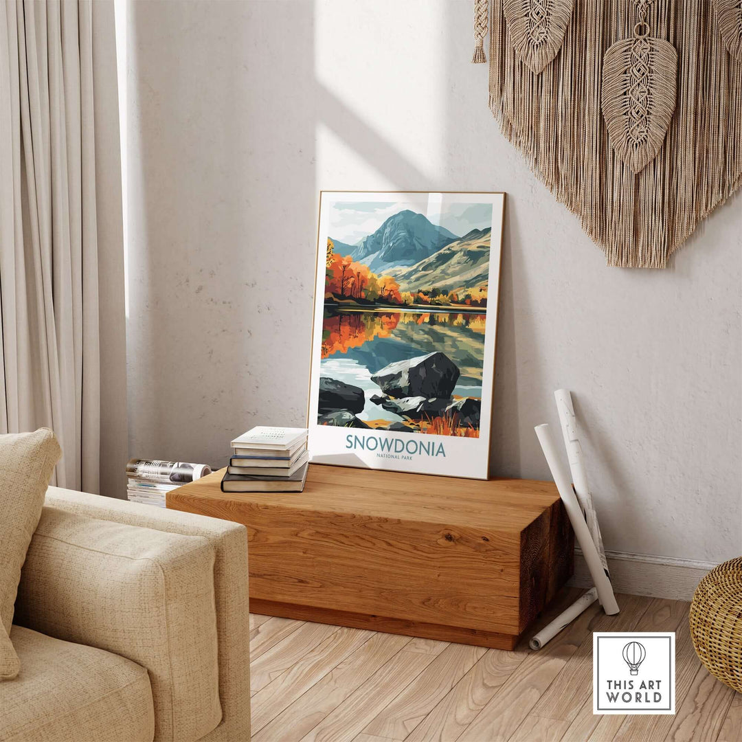 Snowdonia National Park poster displayed in a cozy interior, showcasing vibrant landscape and autumn colors.