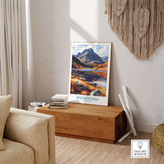 Snowdonia National Park Poster Wales displayed in a cozy living room with autumn scenery.