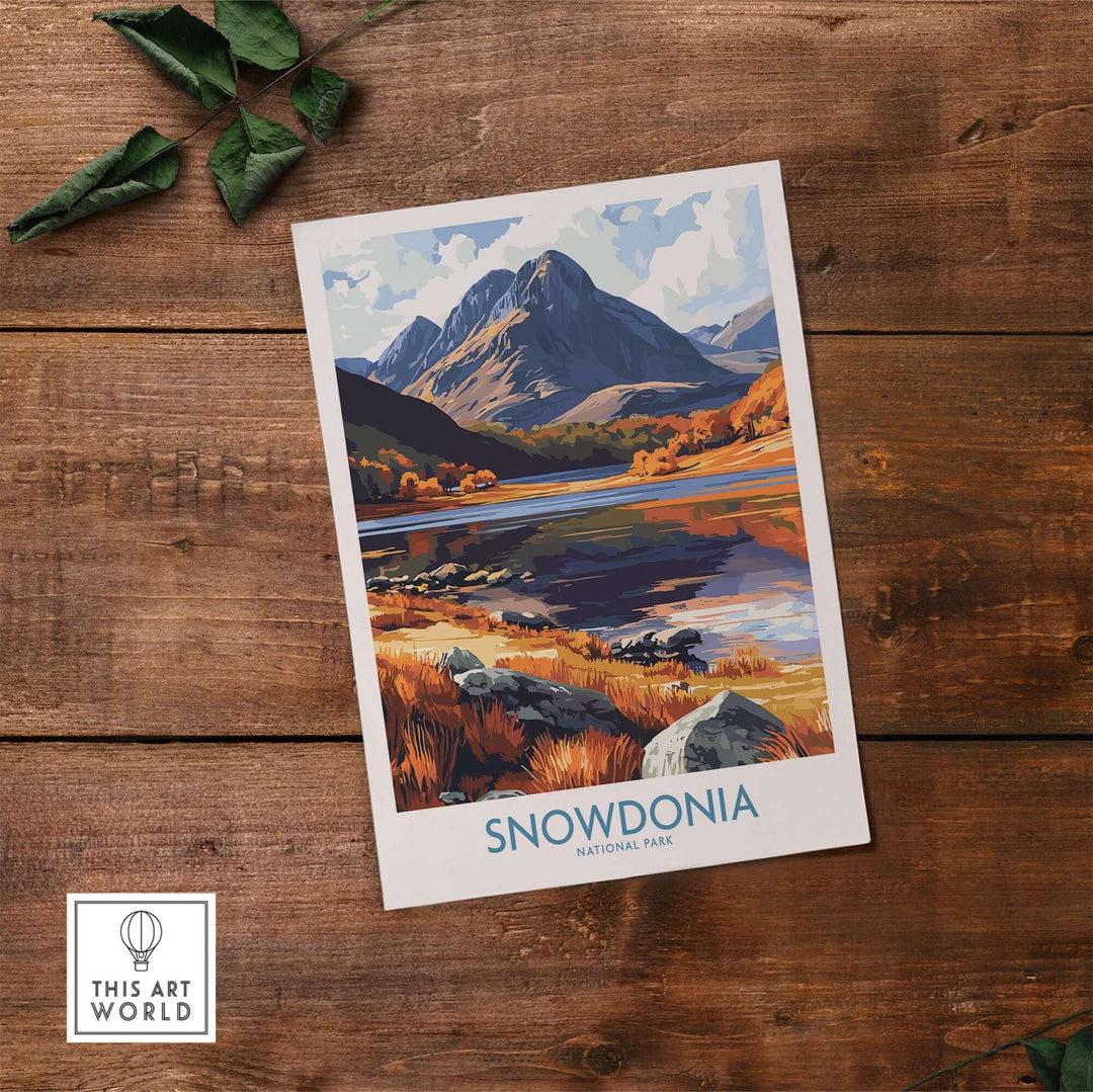 Snowdonia National Park poster featuring vibrant autumn colors and majestic mountains on a wooden background.