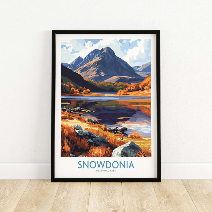 Snowdonia National Park poster showcasing vibrant autumn colors against majestic mountains and tranquil lake.