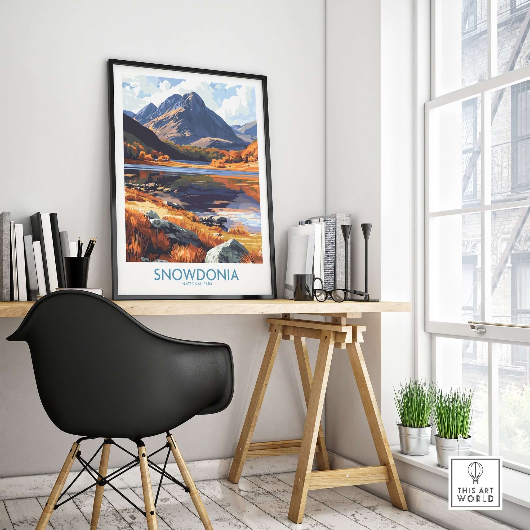 Snowdonia National Park Poster Wales displayed in a chic workspace, highlighting autumn colors and majestic landscapes.