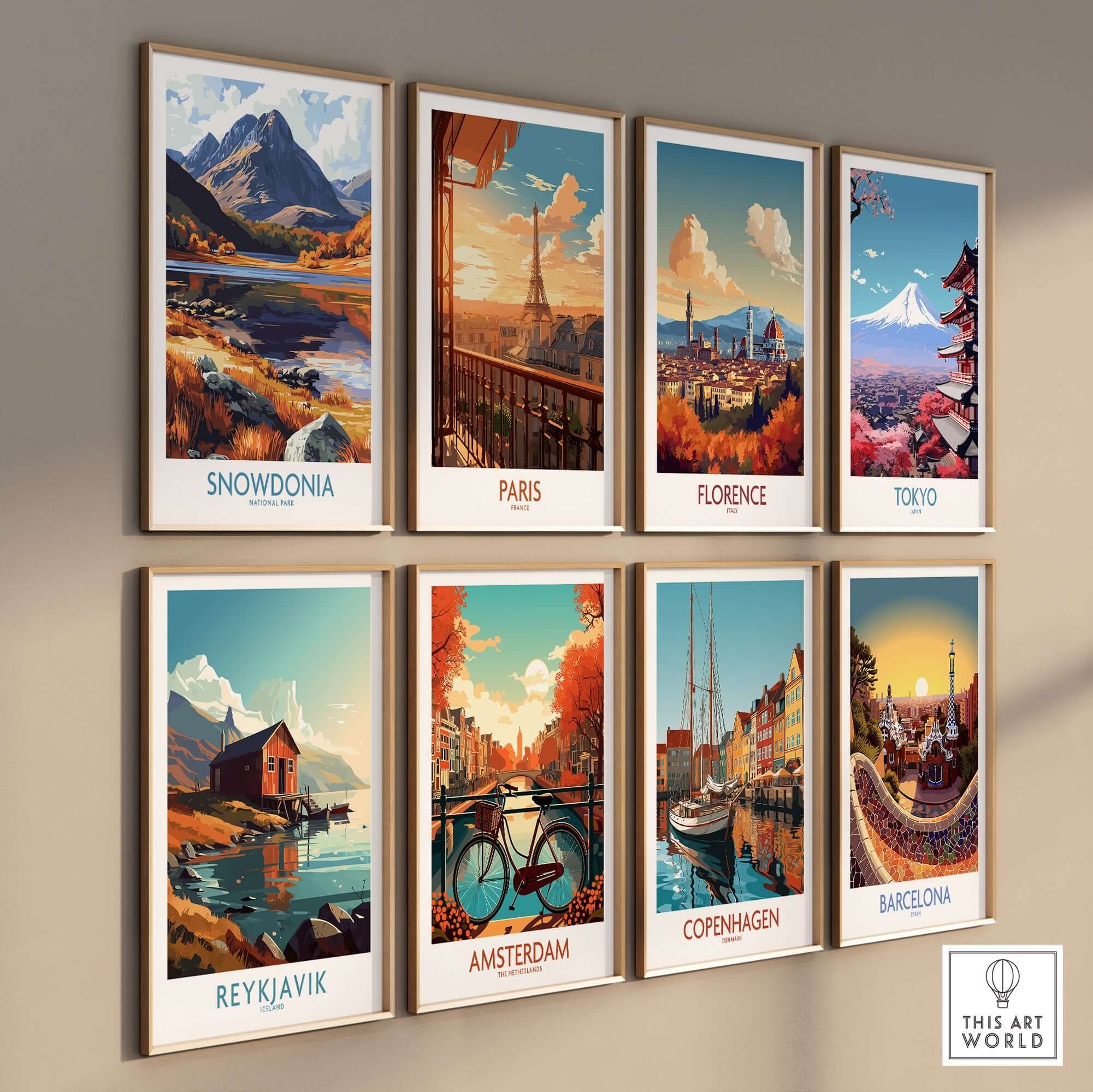 Snowdonia National Park Poster Wales displayed among famous city posters on a wall.