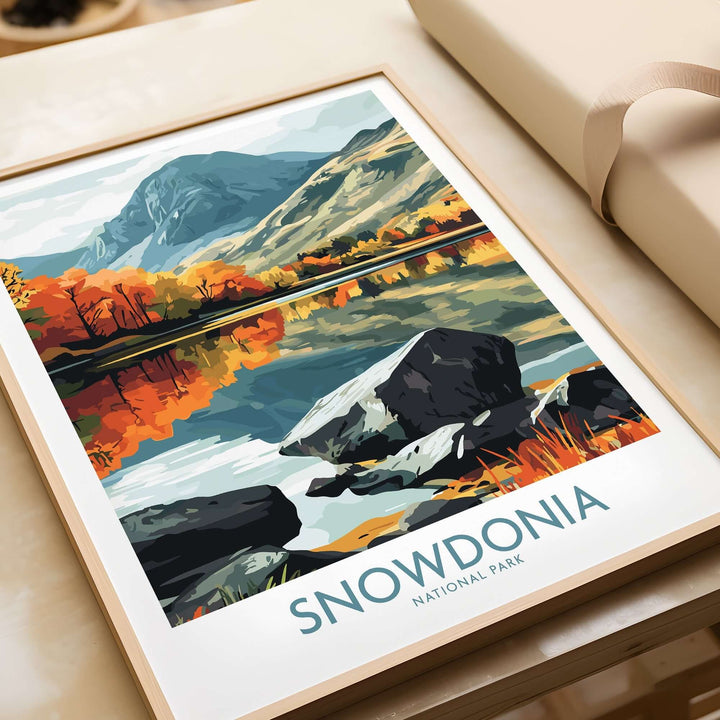 Snowdonia National Park poster featuring vibrant landscapes and autumn colors, framed and displayed elegantly.