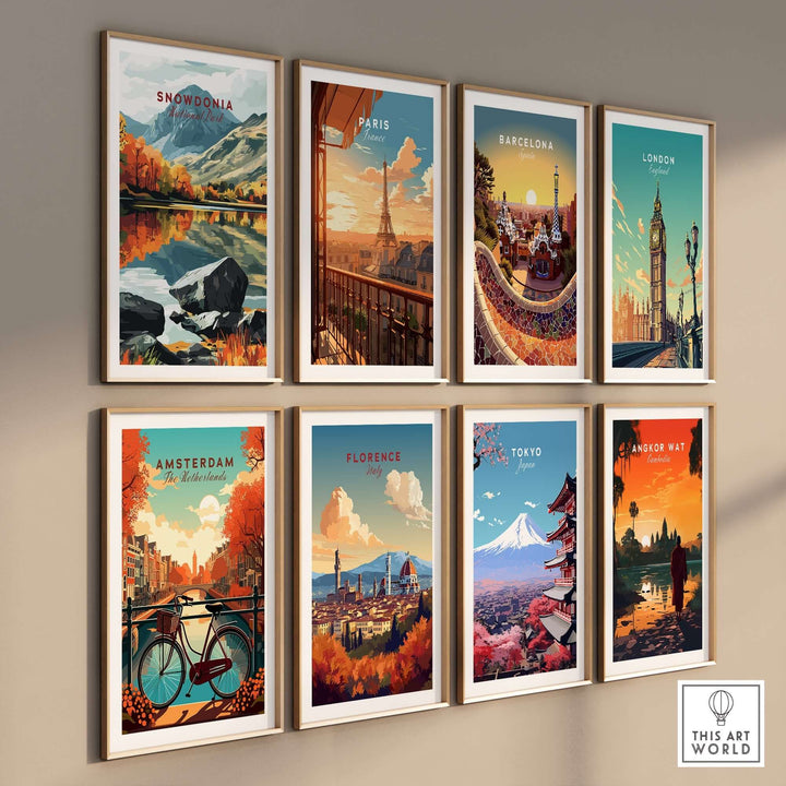 Colorful travel art prints showcasing landmarks from Snowdonia, Paris, Barcelona, London, Amsterdam, Florence, Tokyo, and Angkor Wat.