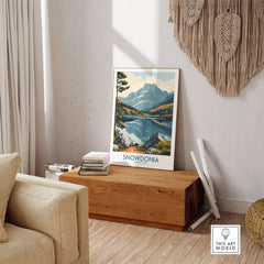 Snowdonia National Park Travel Poster featuring stunning mountains and a serene lake in a stylish home setting.