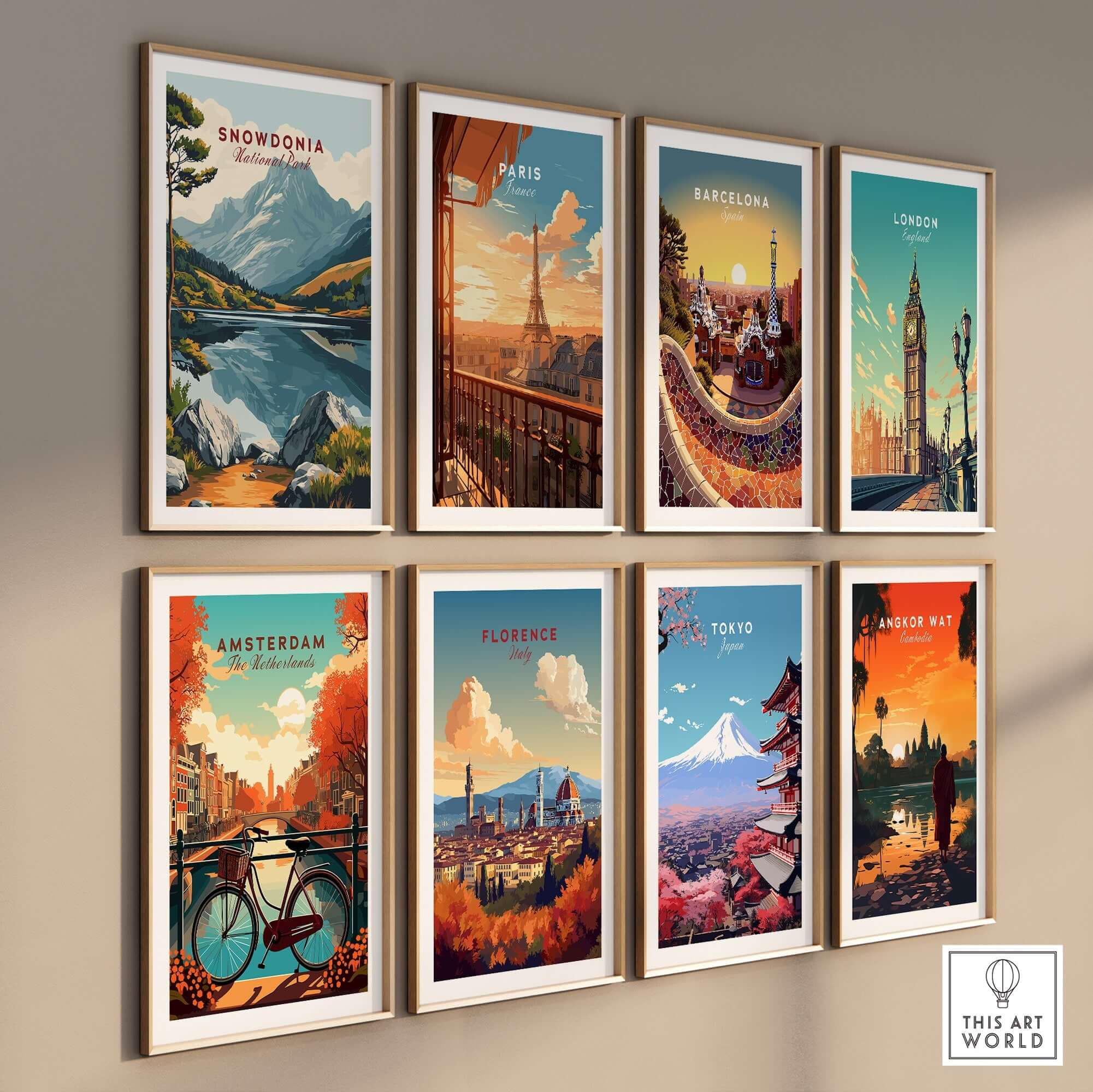 Snowdonia National Park Travel Print among other travel prints on a gallery wall, showcasing iconic destinations.