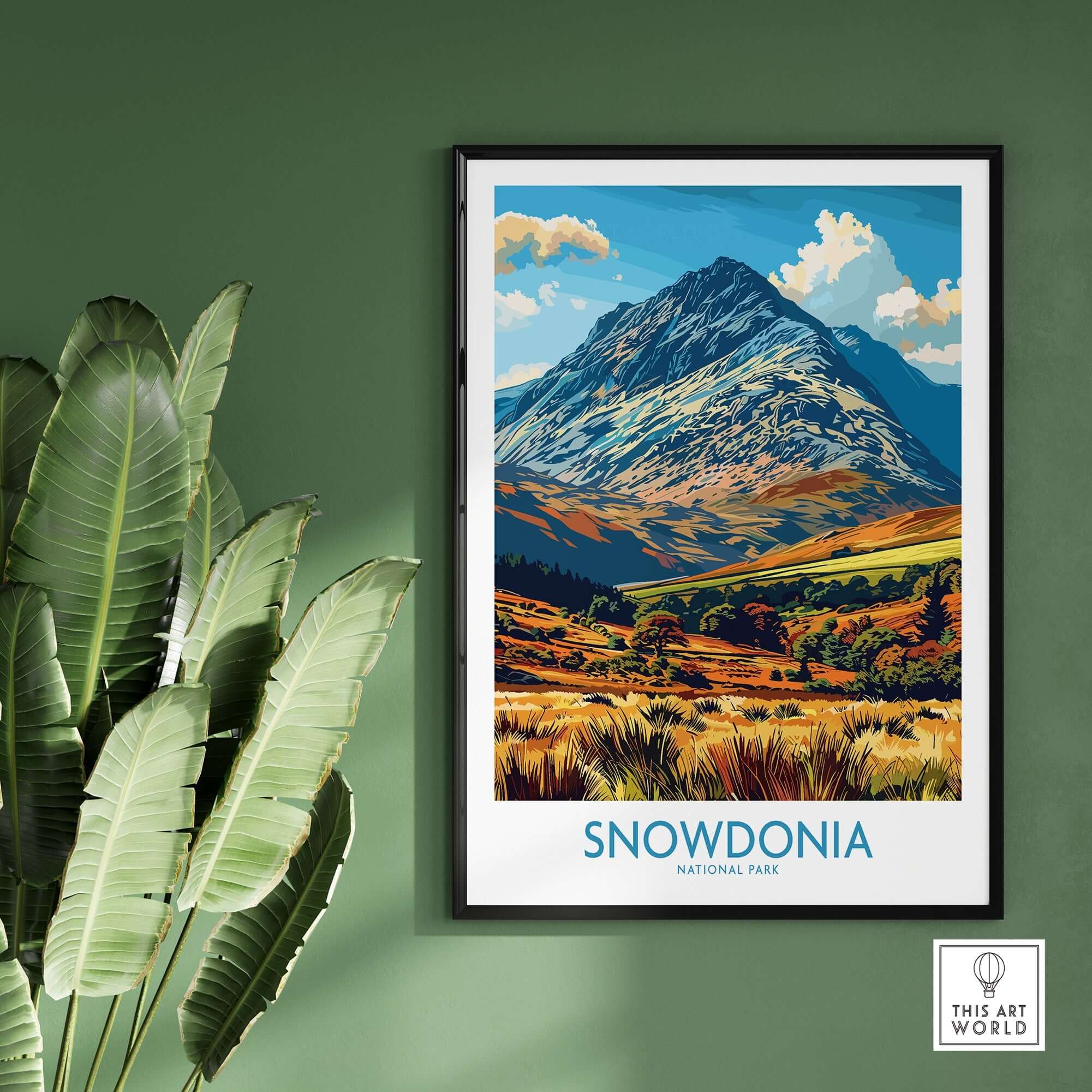 Snowdonia National Park Wales Print featuring a stunning mountain landscape on a green wall.