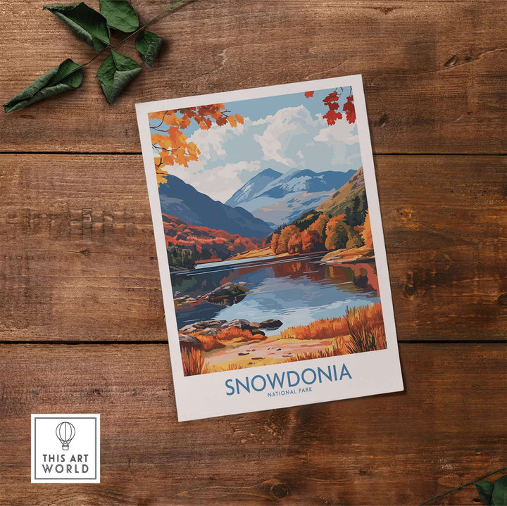 Snowdonia National Park travel print featuring autumn colors, mountains, and a serene lake landscape. Perfect home decor for nature lovers.