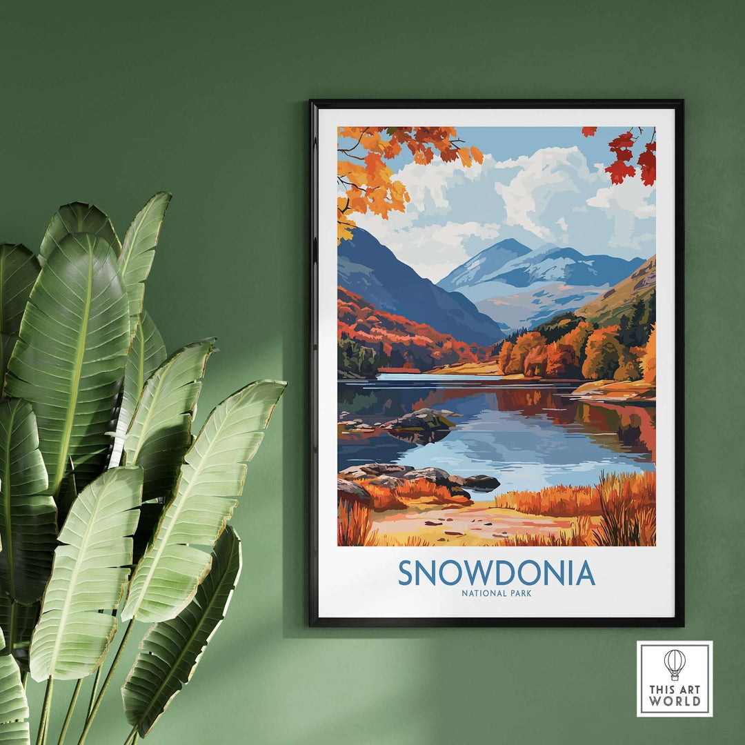 Snowdonia National Park travel print featuring vibrant autumn colors and serene landscape on green wall backdrop.