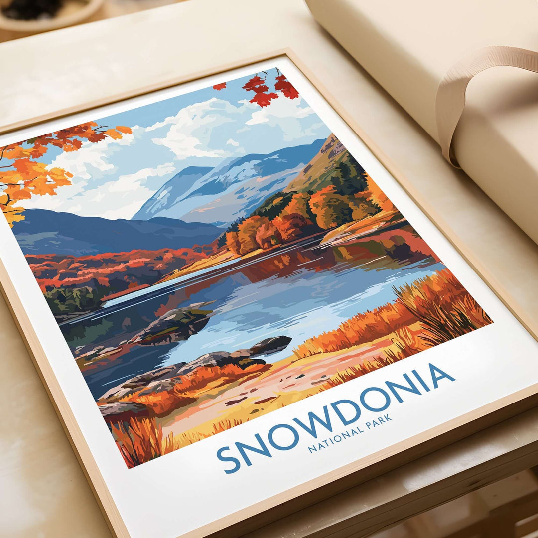 Snowdonia National Park travel print showcasing vibrant autumn colors and serene lake reflections. Perfect for home decor.