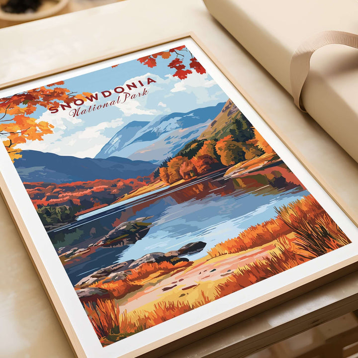 Colorful wall art of Snowdonia National Park, showcasing mountains and a tranquil river scene in autumn.