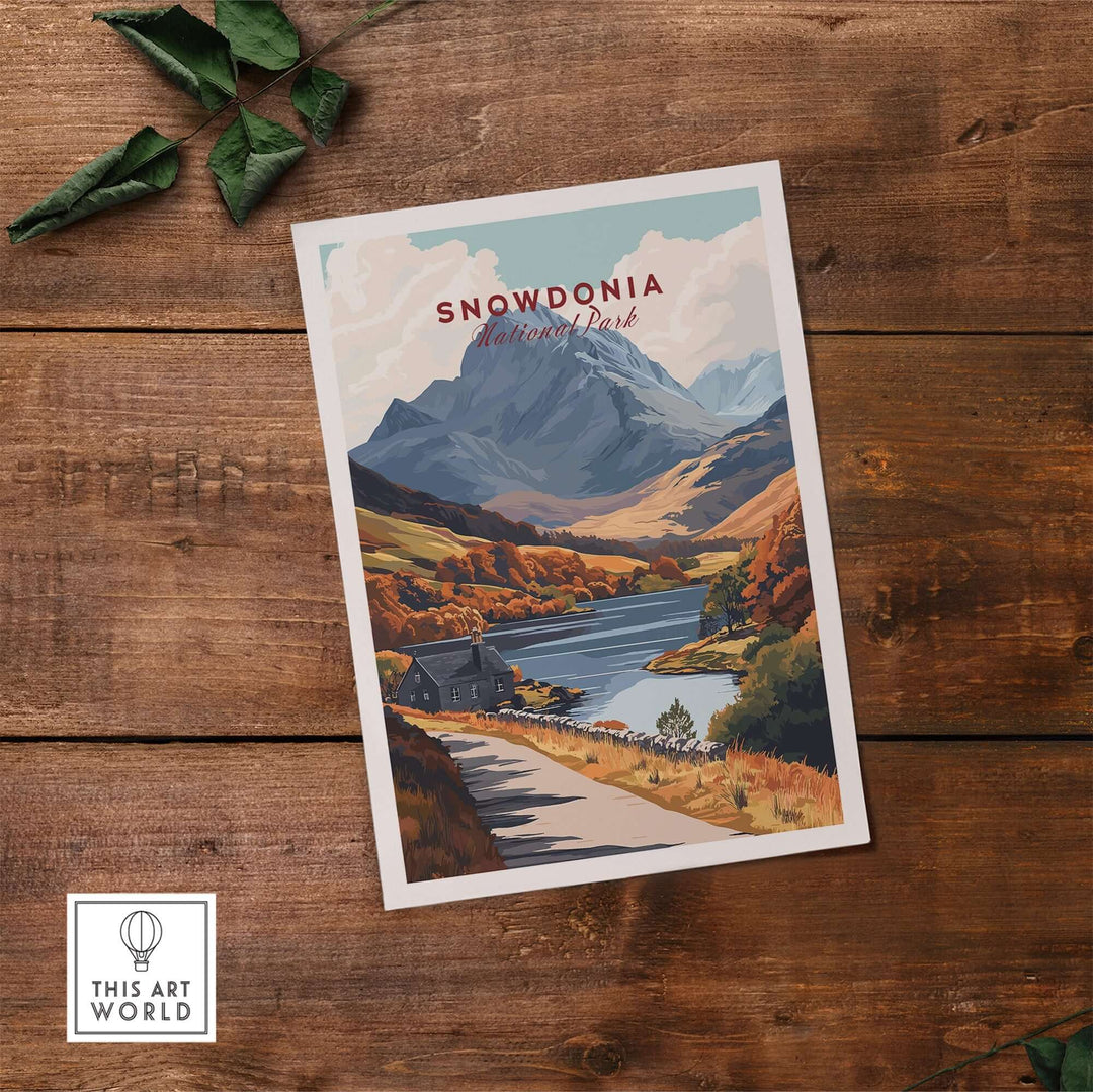 Snowdonia National Park wall art print featuring mountains, lake, and vibrant autumn colors on a wooden background.