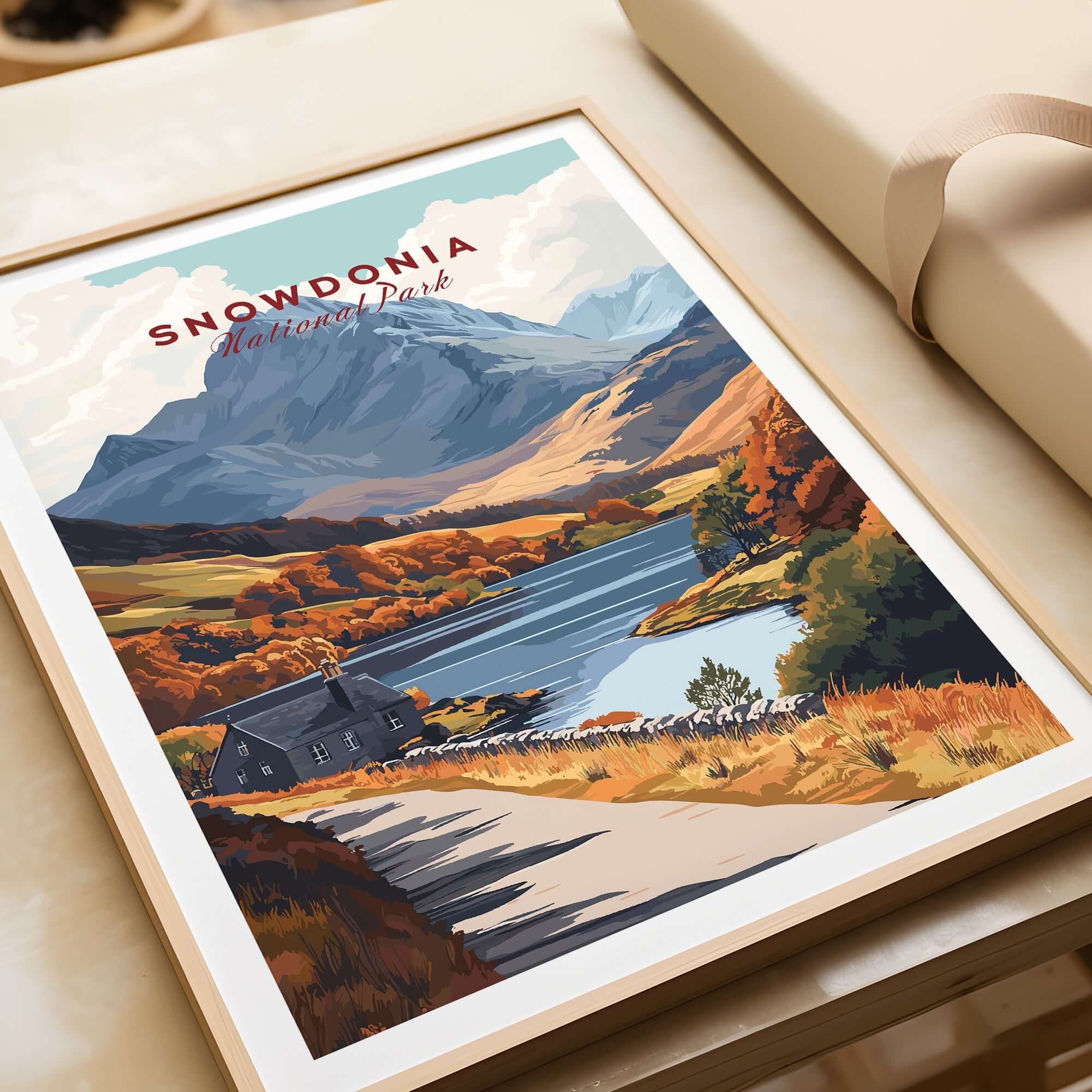 Snowdonia National Park Wall Art showcasing a vibrant landscape with mountains, a lake, and autumn foliage.
