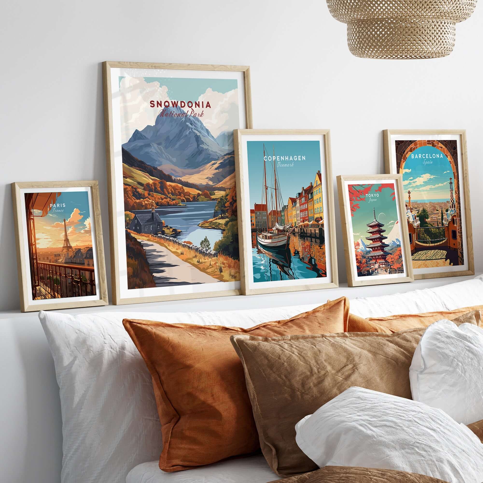 Snowdonia National Park Wall Art displayed among other travel-themed wall art in a cozy home setting.