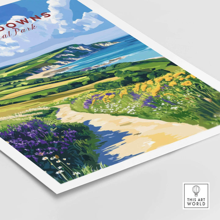 South Downs National Park poster showcasing vibrant flowers and stunning coastal cliffs under a blue sky.