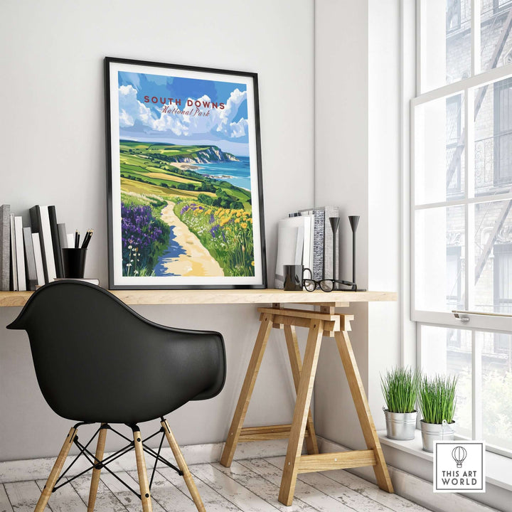 South Downs National Park poster displayed in a stylish home office, showcasing vibrant landscape and iconic cliffs.