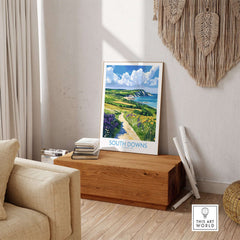 South Downs National Park Poster England displayed in a cozy living room showcasing scenic cliffs and lush landscapes.