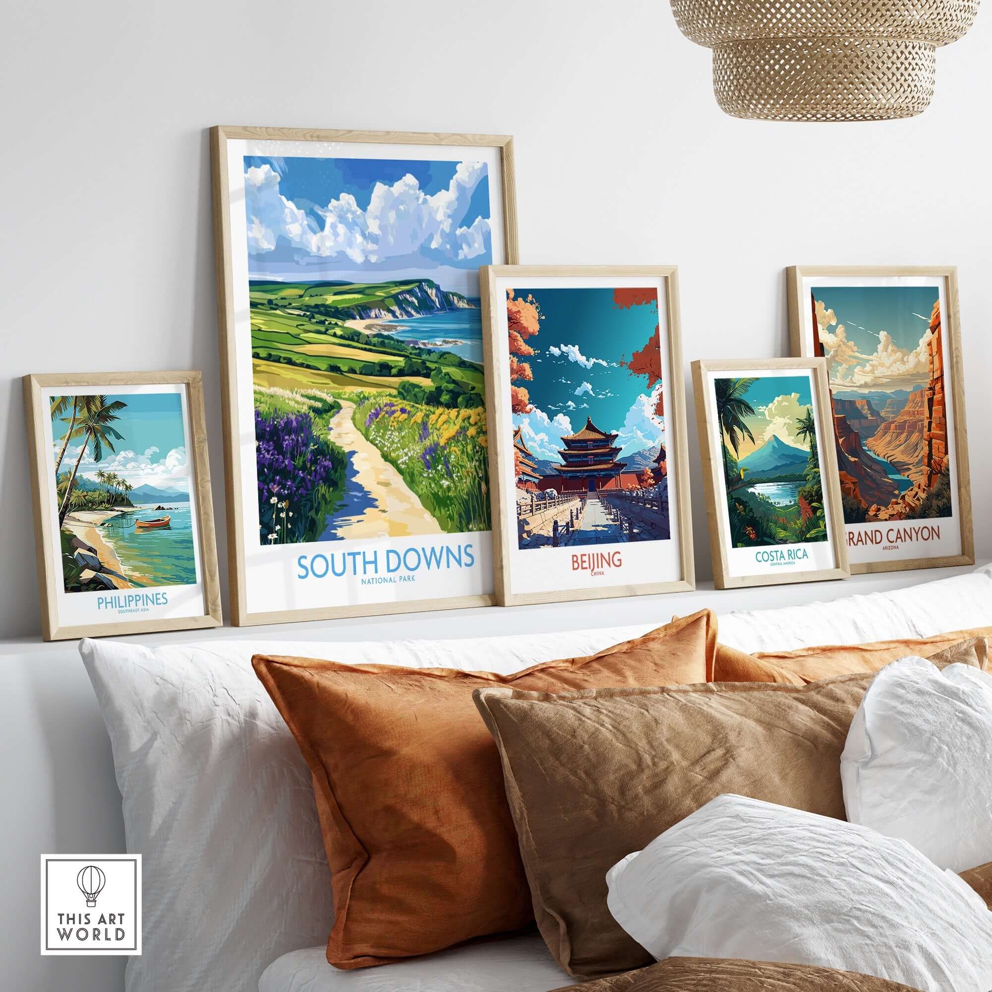 South Downs National Park Poster England displayed among travel posters on a modern decor shelf.