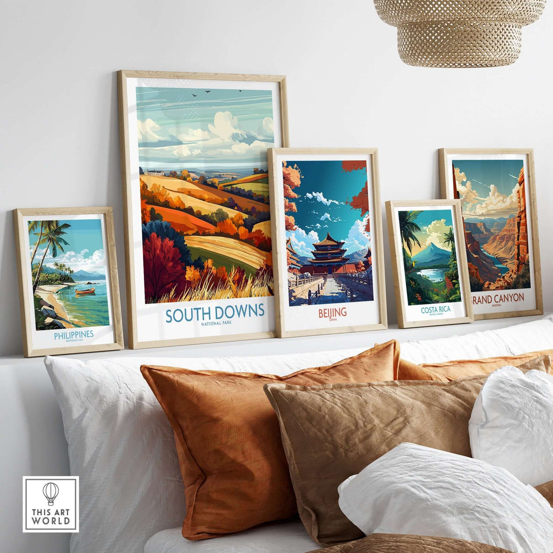 South Downs National Park print showcased among framed art pieces, including landscapes of the Philippines, Beijing, and the Grand Canyon.