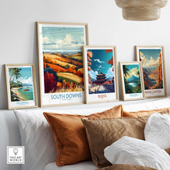 South Downs National Park Print displayed among other travel prints in a stylish home setting.