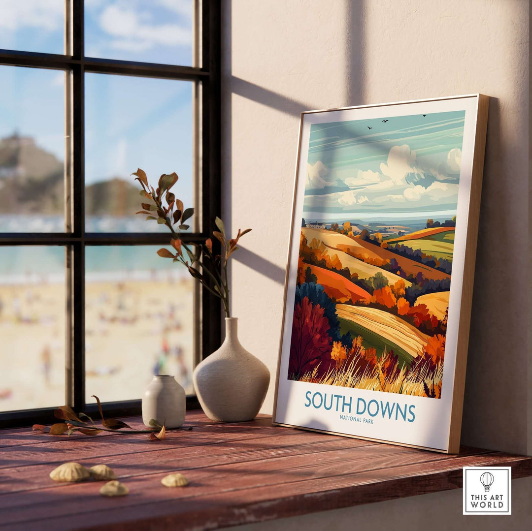 South Downs National Park print displayed on a wooden table by the window, showcasing vibrant colors and scenic landscapes.