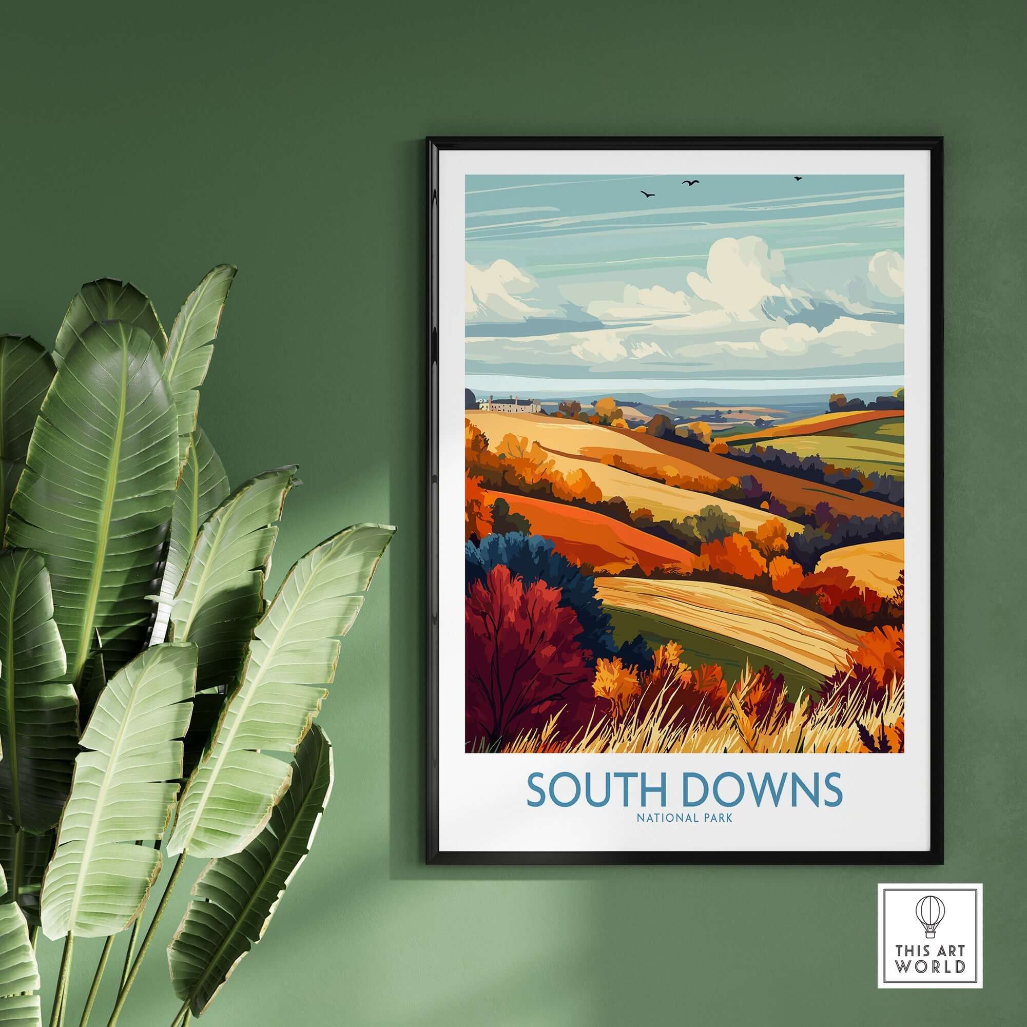 South Downs National Park Print showcasing vibrant colors of the landscape in a framed artwork on a green wall.