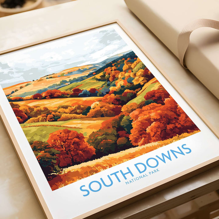 Vibrant South Downs National Park travel poster showcasing autumn colors and scenic landscapes in a stylish frame.