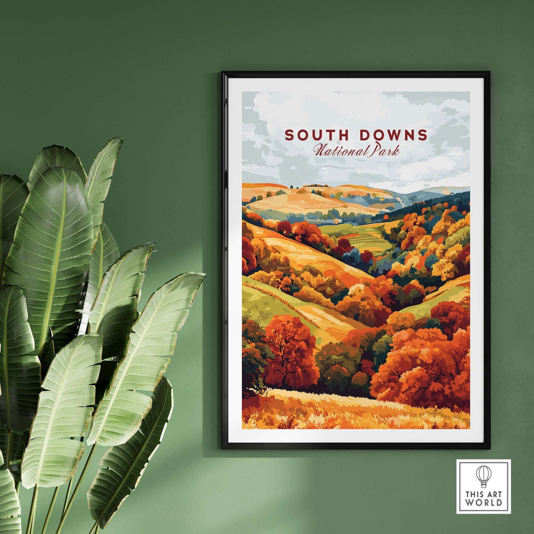 South Downs National Park travel print showcasing vibrant autumn landscape in a stylish frame against a green wall.