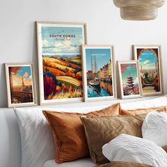 South Downs National Park Wall Art displayed alongside other vibrant travel posters in a cozy home setting.