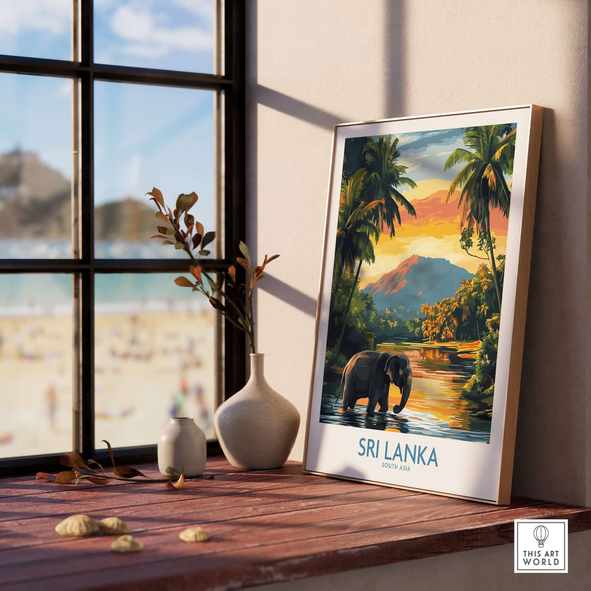 Sri Lanka Travel Art Print - Elephant Swimming Wall Art, Tropical Adventure Scene framed on wooden table by a window.