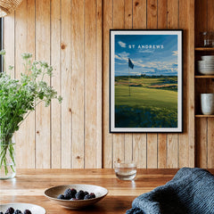 St Andrews Poster Scotland - Golf Print displayed in a cozy interior setting with wood elements.