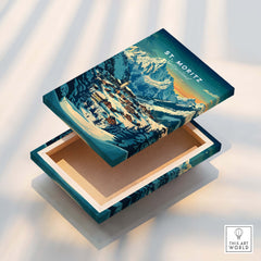 St Moritz Ski Poster - Switzerland displayed on a wooden box revealing beautiful ski art with snowy mountains.