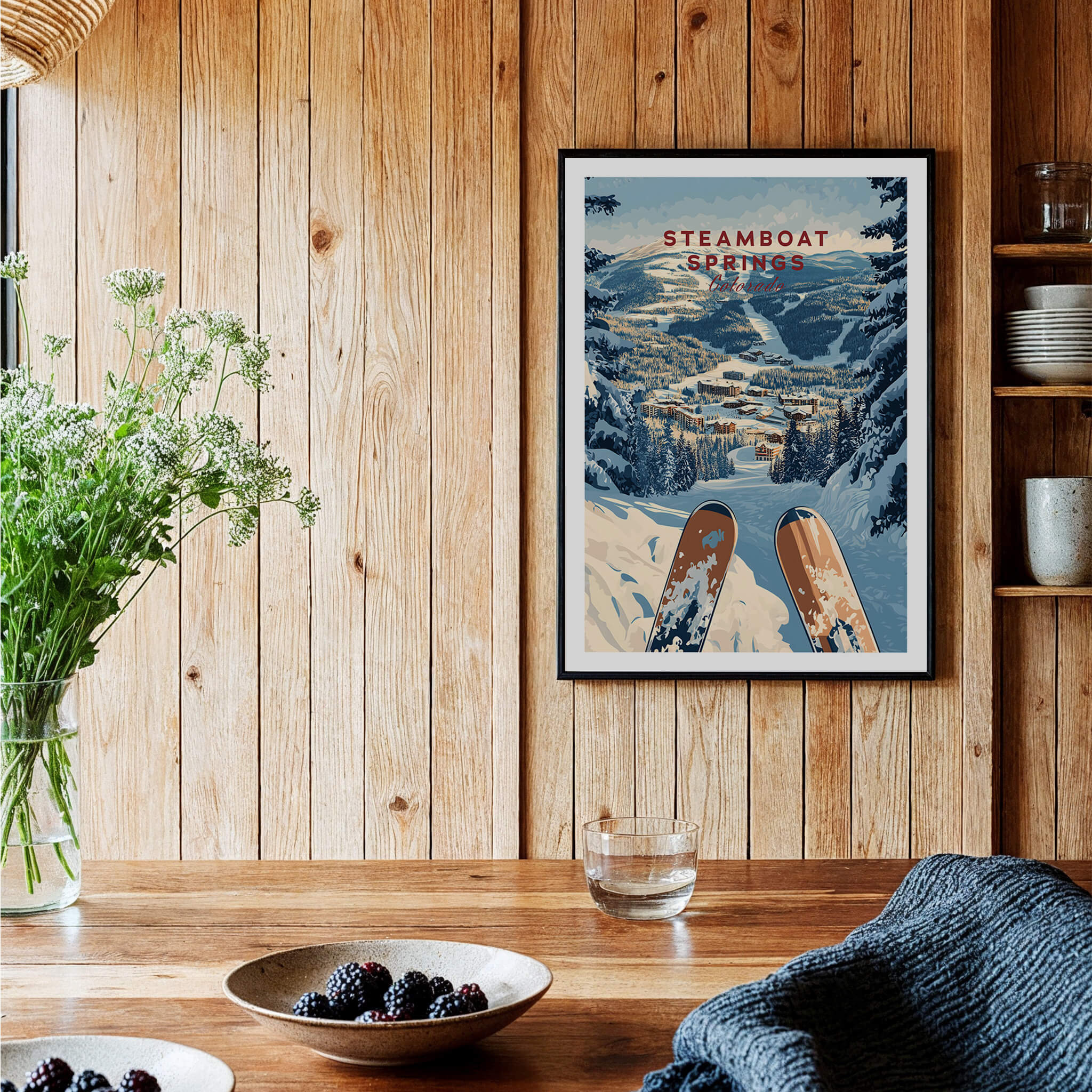 Steamboat Springs Travel Poster - Colorado featuring vibrant ski print displayed in a cozy, rustic setting.