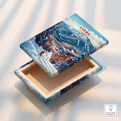 Stowe Mountain Range Poster - Vermont Skiing Print, Alpine Wall Art on a decorative box showcasing a snowy landscape.